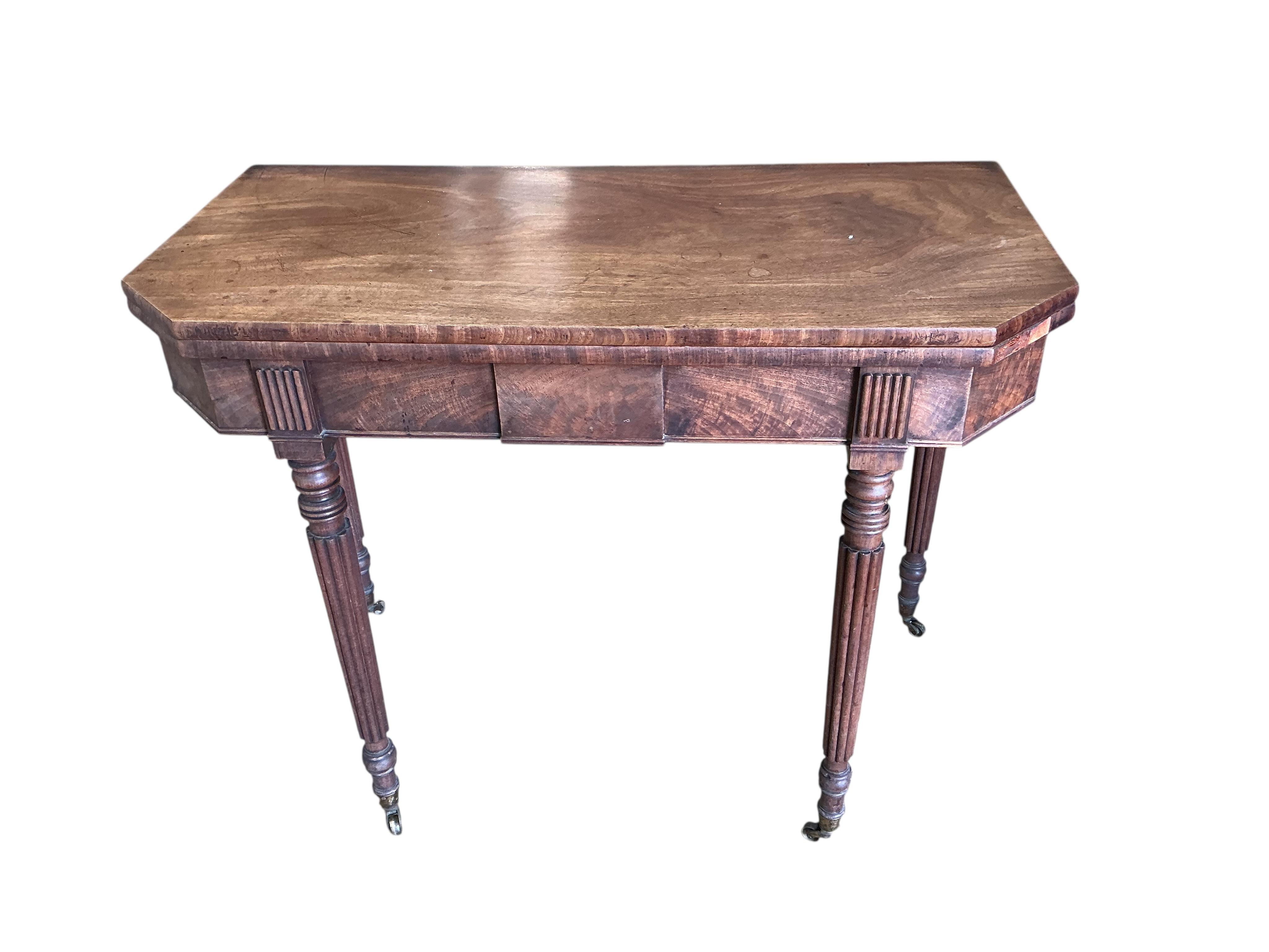 A Regency mahogany folding tea table, width 91cm, depth 45cm, height 74cm